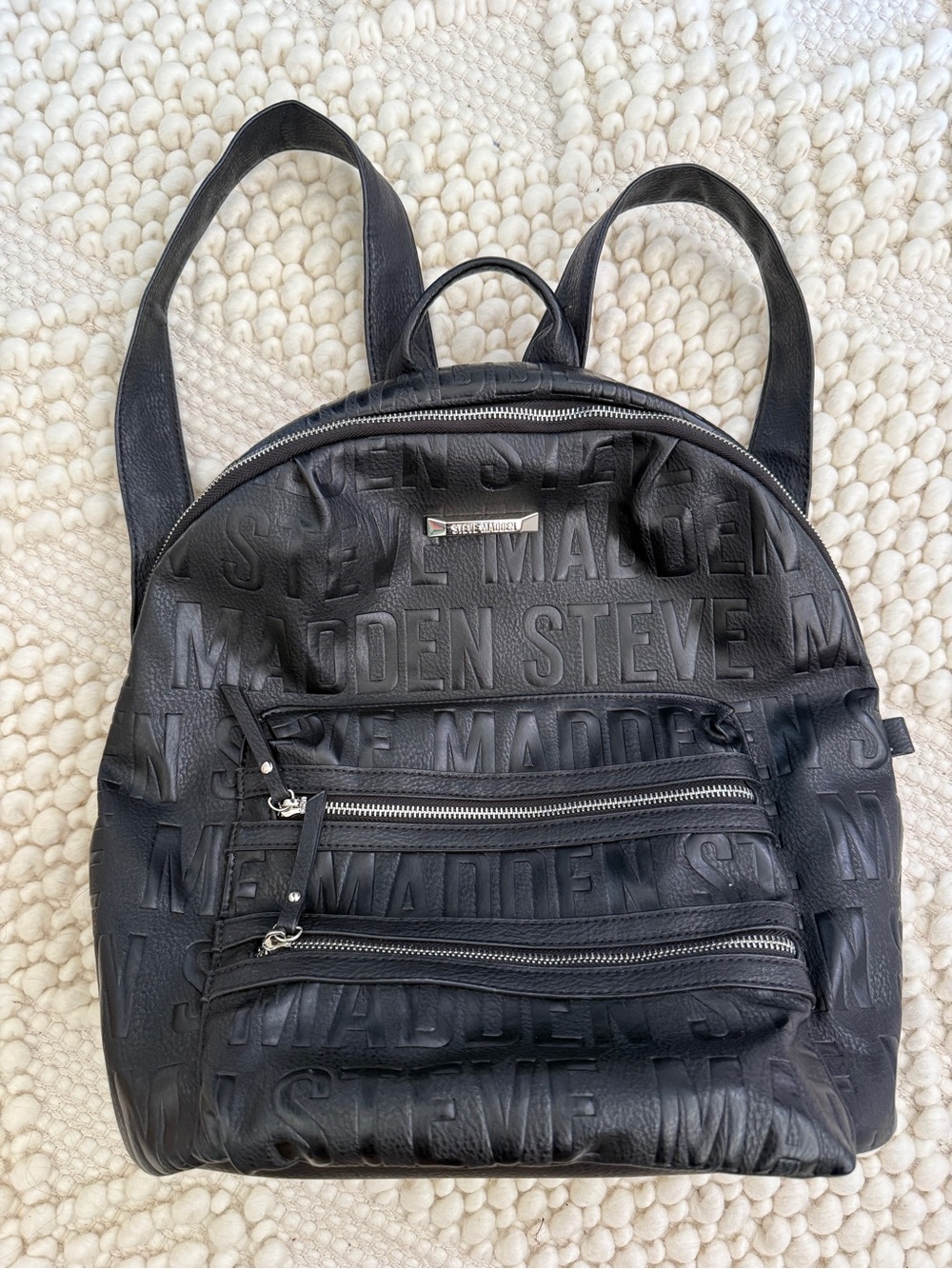 Steve Madden Black Faux Leather Embossed Logo Backpack
